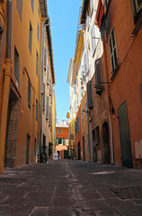 narrow colored street in old town Hyères - FRANCE