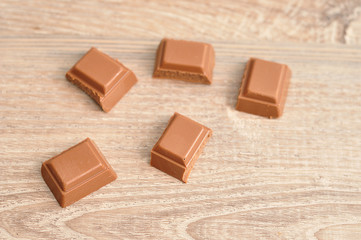 A chocolate candy bar broken into pieces