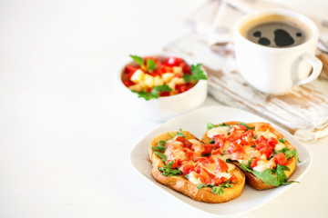  bruschetta with  tomatoes, mozzarella cheese and herbs