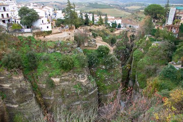 Fototapeta na wymiar deep gorge in famous village Ronda