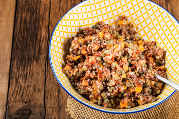 Red rice, lentils and butternut squash with carrot and quinoa in