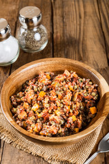 Red rice, lentils and butternut squash with carrot and quinoa in