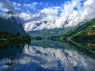 Norwegian landscape reflected in lake