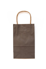 Gray paper bag on white background. Mockup. Concept of shopping.
