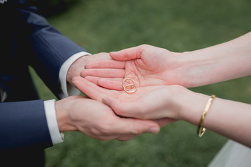 wedding rings in open hand