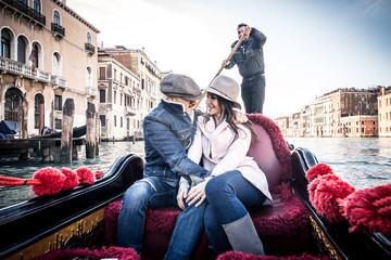 Couple sailing on venetian gondola © oneinchpunch