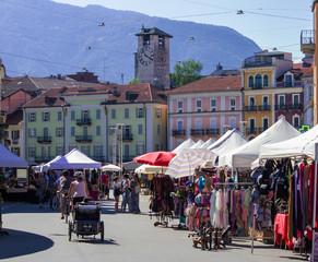 crowded square for the open market in Bellinzona, Switzerland