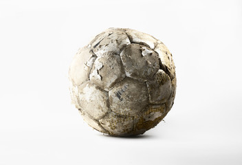 Damaged soccer ball isolated on white background © foulon