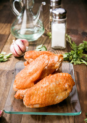 chicken wings wrapped in pepper ready for cooking