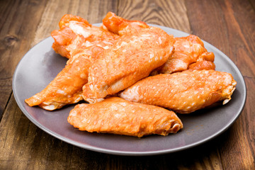 chicken wings wrapped in pepper ready for cooking