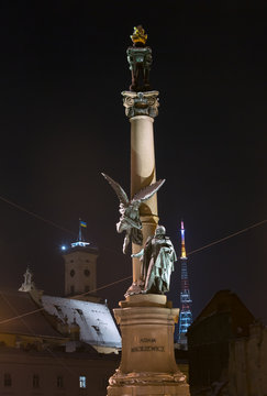 Night winter Adam Mickiewicz monument, Lviv, Ukraine