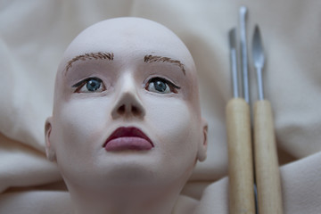 A face mannequin, tools for making dolls