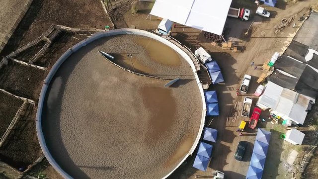 Aerial view of horse riding activity at mountains and valley