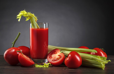 Bloody Mary cocktail garnished with a celery sick .