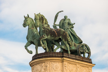 Fototapeta premium Allegorical statue of Peace in Heroes Square in Budapest, Hungary.The sculptures were made by sculptor Zala György from Lendava in 1896 in Budapest.d