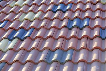 Many tiles together on the roof
