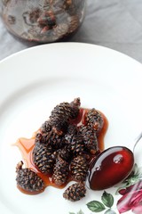 Fresh jam from pine cones in the bowl  