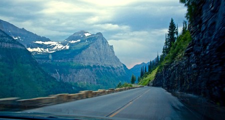 Drive through Glacier National Park with Storm Clouds