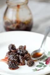 Fresh jam from pine cones in the bowl  