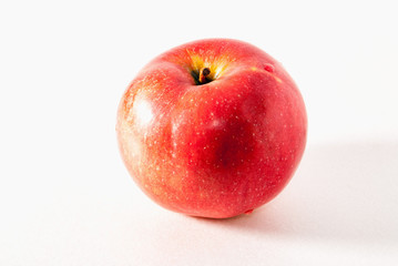 red apple on a gray background