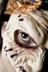 Naklejka premium Zombie woman with dead living mask