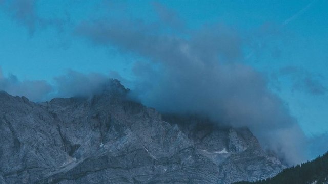 The highest mountain in Germany, Zugspitze surrounded by clouds. This mountain is located in the Bavarian village Garmisch