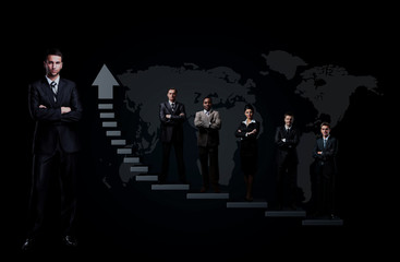 business team is standing on a graph