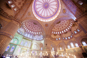Fototapeta na wymiar ISTANBUL, TURKEY - JAN 13, 2018: Interior of the Sultanahmet Mosque (Blue Mosque) in Istanbul