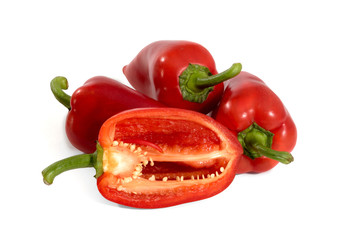 Red fresh chopped peppers on a light white background