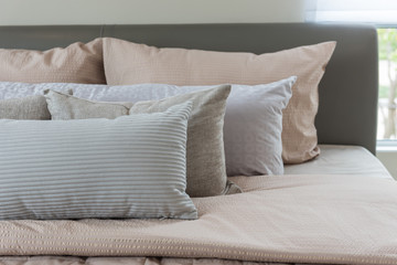 Fototapeta na wymiar set of pillows on king bed size