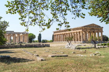 Fototapeta na wymiar Classical greek temple at ruins of ancient city Paestum, Italy
