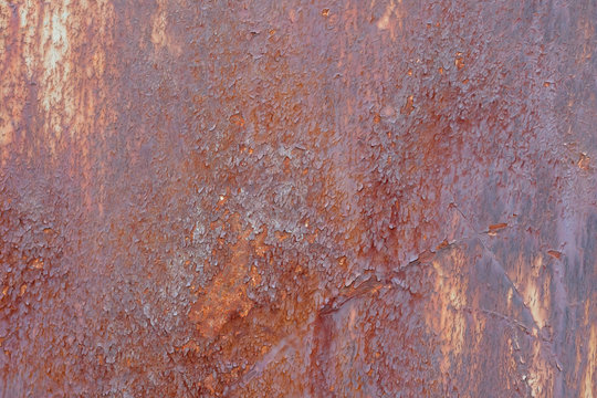 Rost mit schuppigen Abplatzung