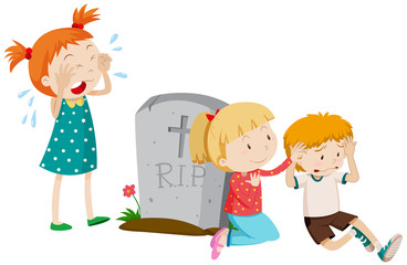 Fototapeta na wymiar Three sad children by the grave