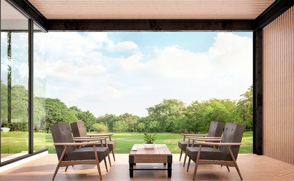 Wood pavillion with garden view 3d rendering image.There are woodden floors,wall and ceiling .Furnished with brown leather and wood furniture. Surounded with the large garden.