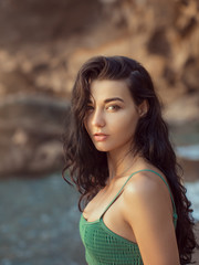 Portrait of beautiful young woman on beach.