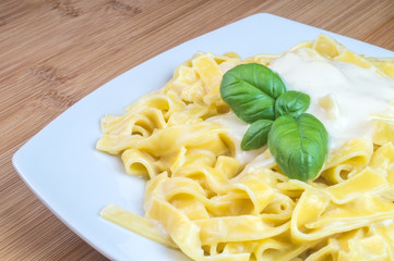 Tagliatelle pasta with 4 cheeses - 189866424