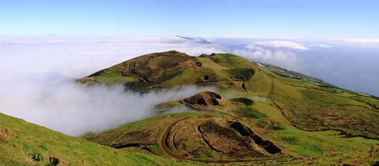 Small crater landscape above the clouds at Sao Jorge Island at the Azores, Portugal