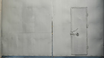 Obraz na płótnie Canvas Silver gate with a gate with a lock.