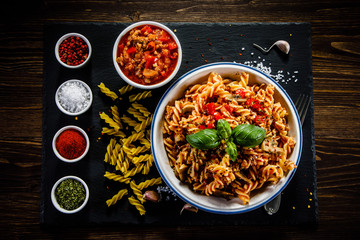 Pasta with meat, tomato sauce and vegetables 