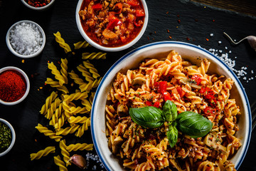 Pasta with meat, tomato sauce and vegetables 