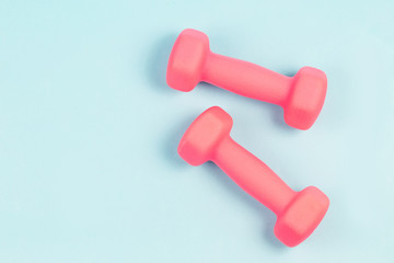 Dumbbell in the blue background