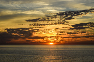 dramatic sunset over the ocean