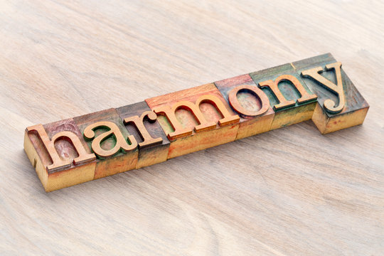 harmony word abstract in wood type