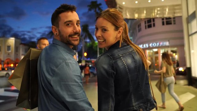 Cheerful couple on a shopping day
