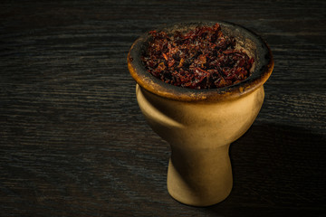 Hookah bowl, with tobacco stuffed into it
