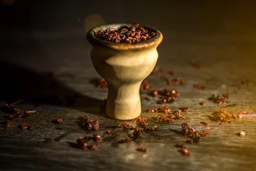 Fotobehang Hookah bowl, with tobacco stuffed into it © btxstudio