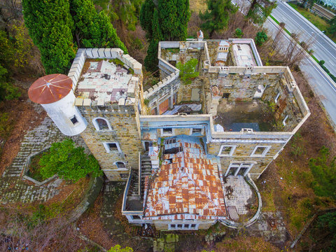 Drone view of the abandoned old mansion called Dacha Kvitko near Kurortnyy Prospekt in autumn day, Sochi, Russia
