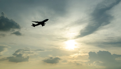 The airplane taking off to the sky in morning