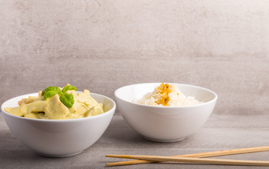 green cocos curry sous with chicken and rice