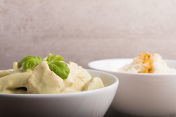 green cocos curry sous with chicken and rice